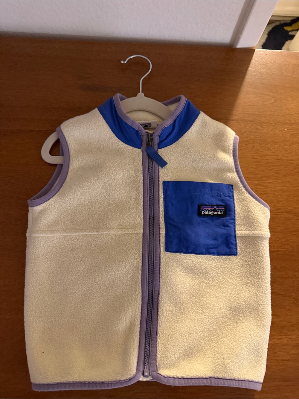Patagonia Kids Cream Fleece Vest with Blue Pocket and Lavender Trim